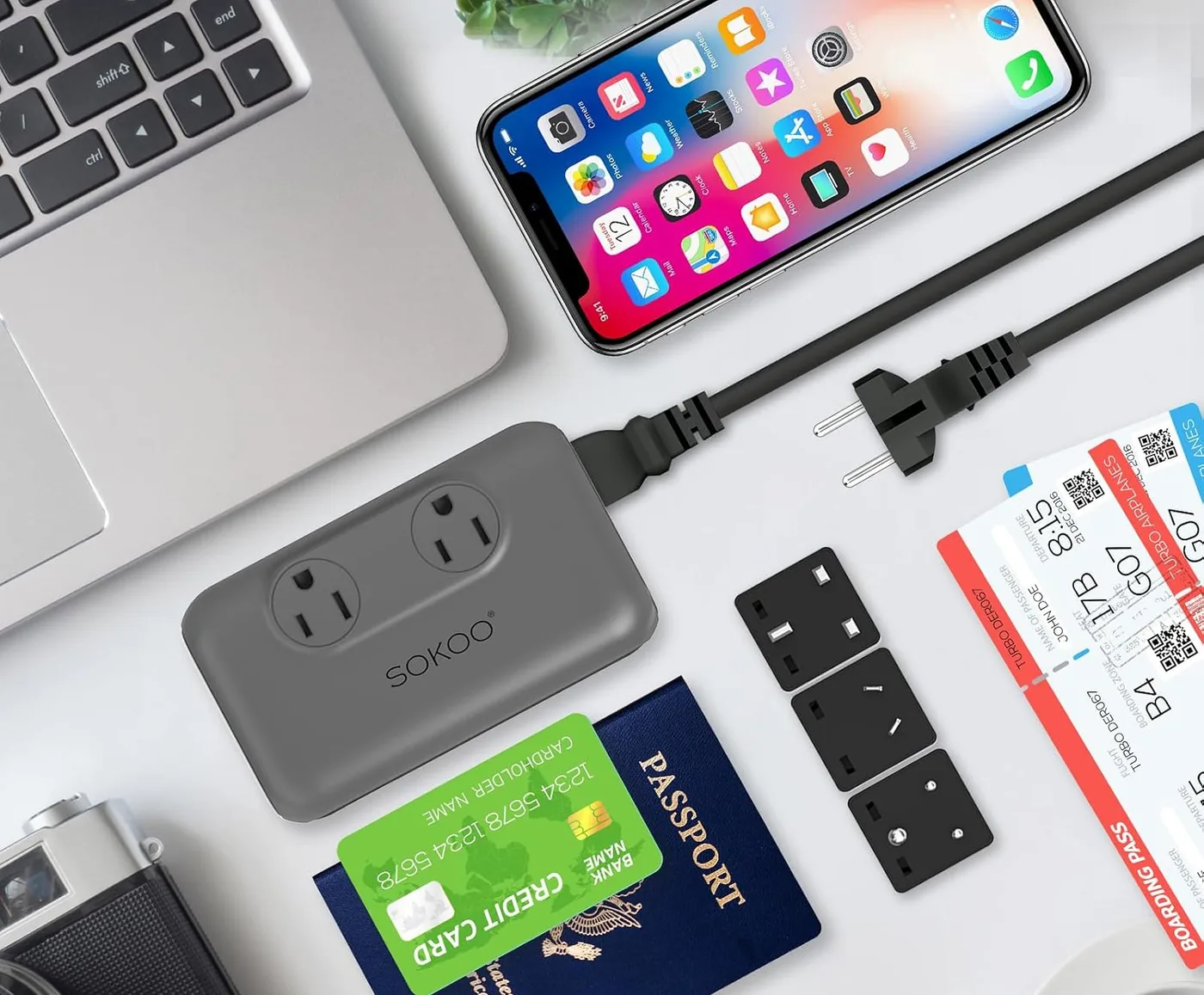 SOKOO converter packed with a passport, boarding passes and plug adapters